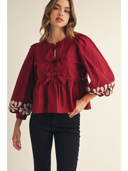 Jodifl Peplum Bow Top with Embroidered Edges